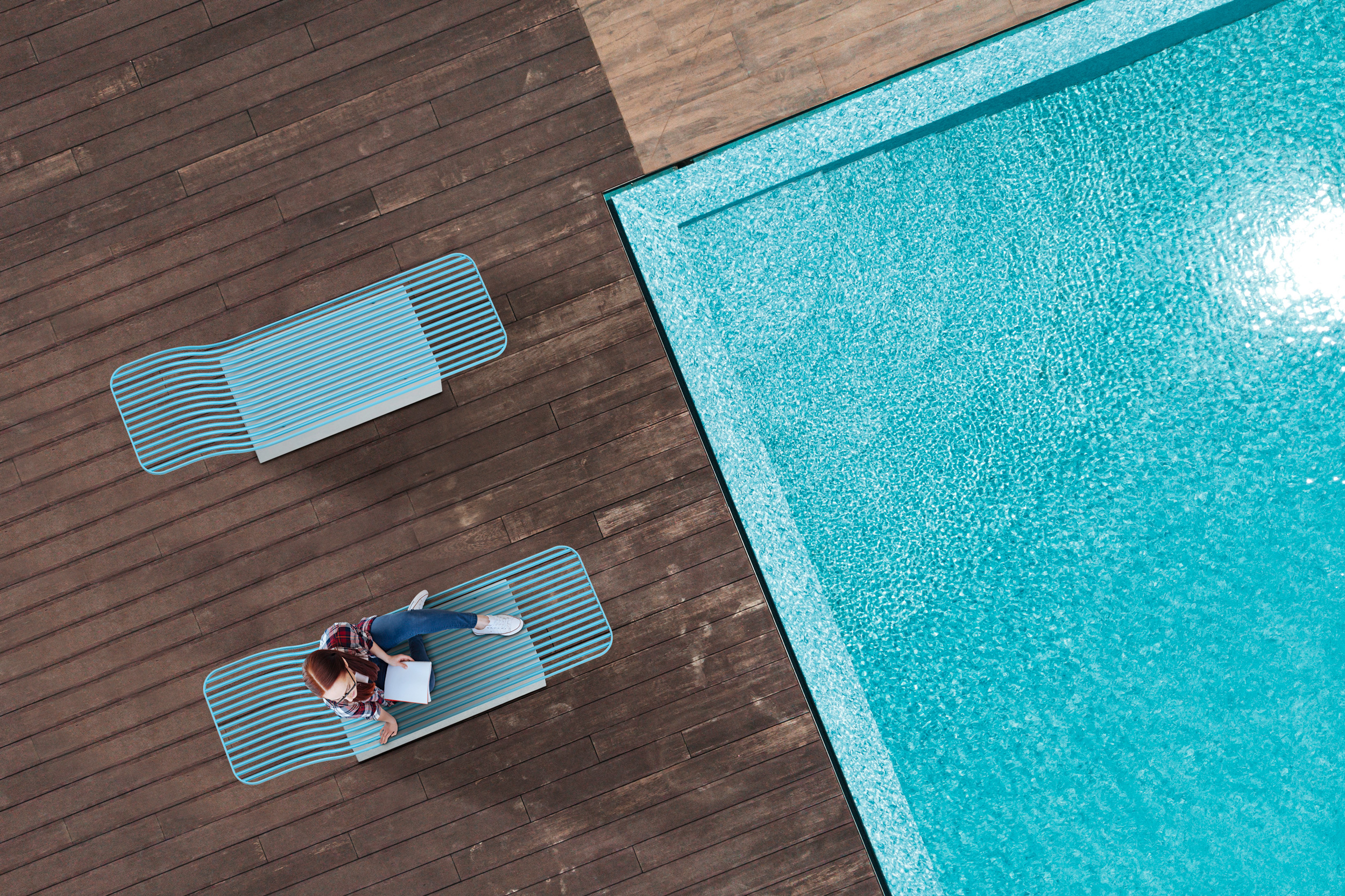 Plint outdoor benches and chaise longues collection designed by Pastina for Punto Design concrete steel poolside